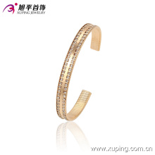 51382 Xuping brazalete de brazalete de acero inoxidable chapado en oro simple con muchas gemas pequeñas